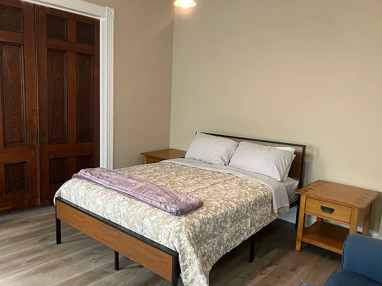 Large, fully furnished second bedroom with a new queen-size bed with a hybrid mattress