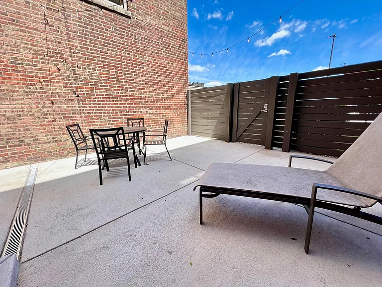 Another view of the patio, also showing the privacy fence.
