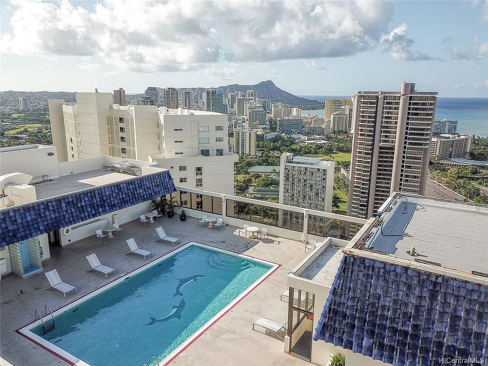 Upper deck with almost 360 view of Waikiki and mountains. Pool deck has BBQ area, showers, yoga and weight room, gym facilities.