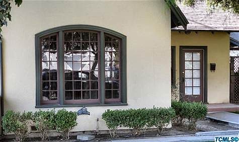 Hardwood arched window frame