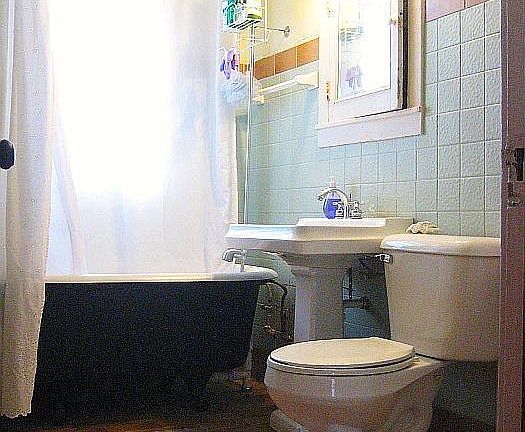 Bath with shower over claw foot tub
