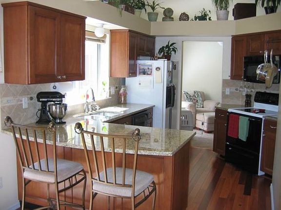 Kitchen w/ open floor plan