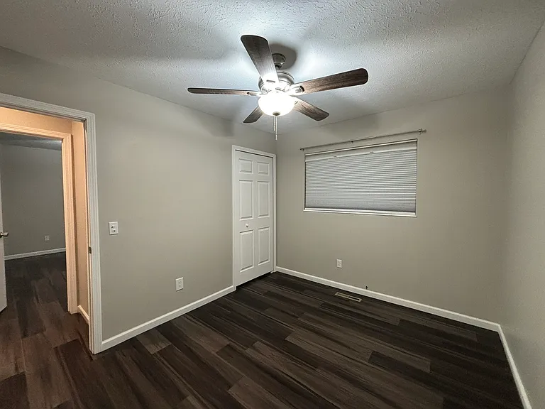Bedroom #2: Large window with a great view into the large backyard.