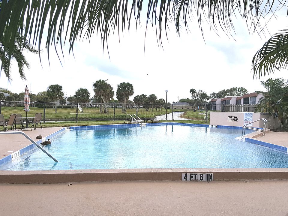 Pool overlooking golf course