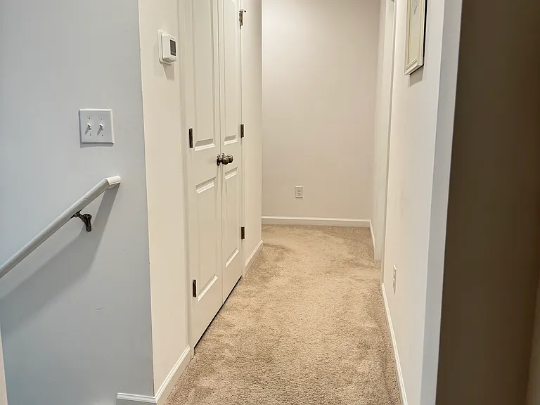 Quiet, well-lit hallway on the second floor.
