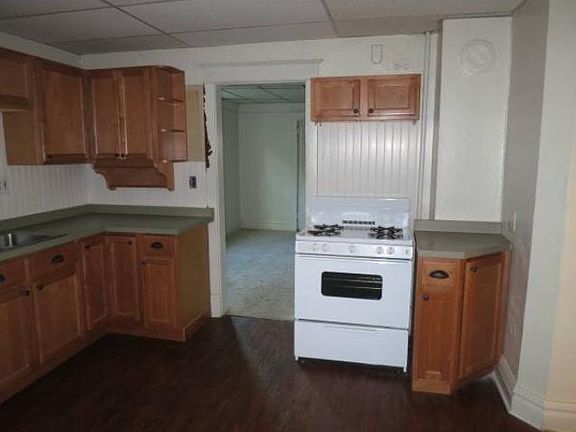 Kitchen looking into living room