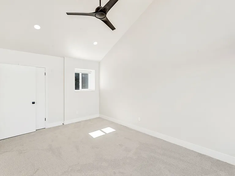 Bedroom #2 - on upper level. Floor to ceiling windows with electric black out window shades.