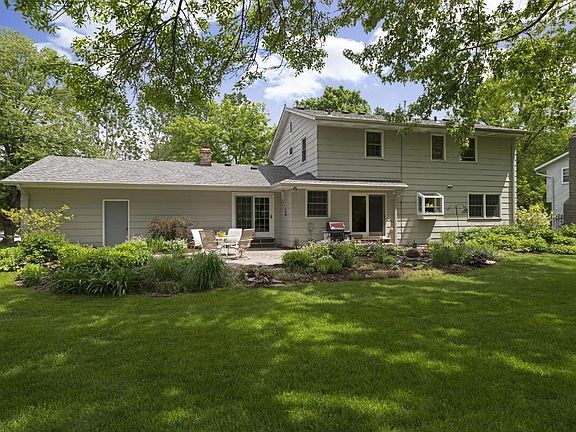 Backyard is fenced and beautifully landscaped.