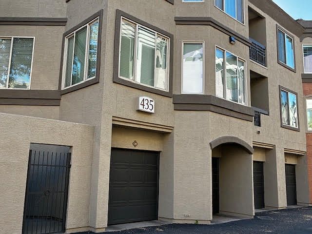 corner unit with a one car garage