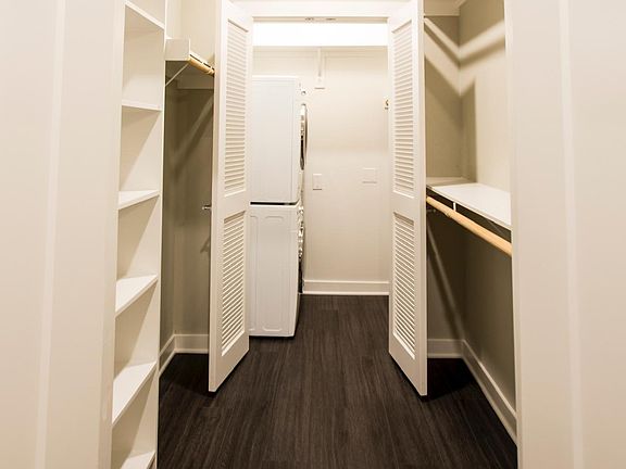 Double walk-in closet with full-size washer & dryer included.