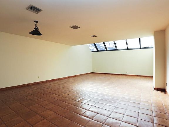 First floor patio home in the high rise. Double door entrance into foyer with open dining area 20 x16.