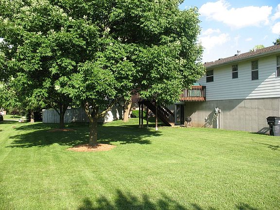large backyard w/mature trees