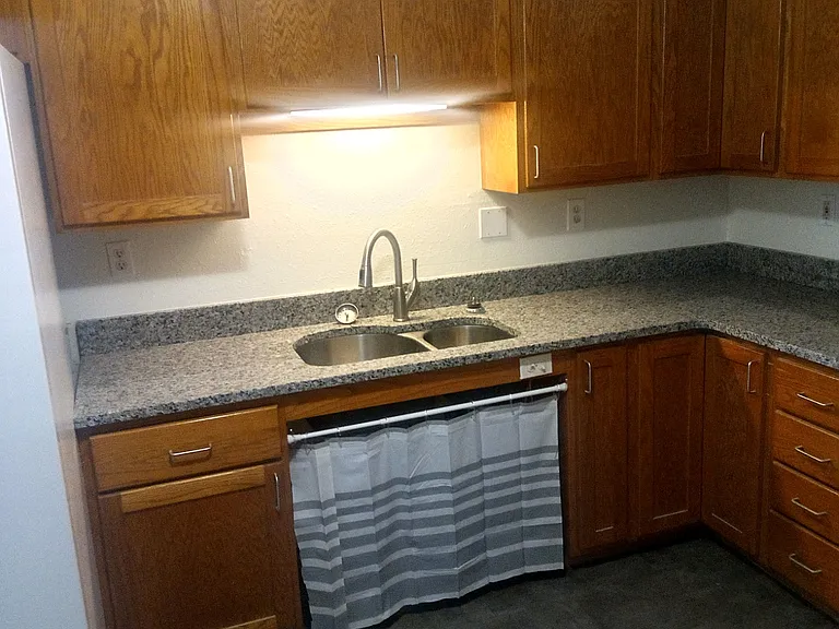 New granite counter tops, kitchen sink & faucet.