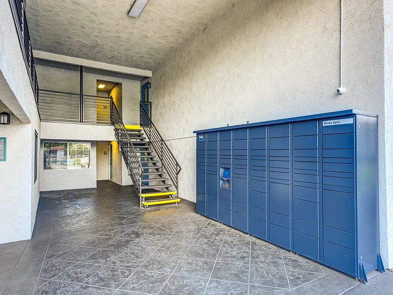 the Amazon lockers in the office lobby next to a staircase