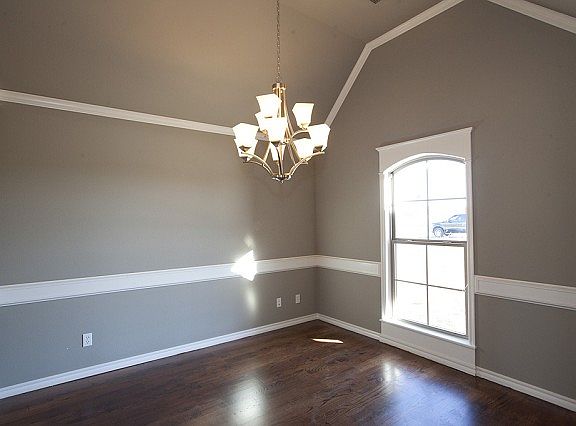 Formal dining with hardwood floors