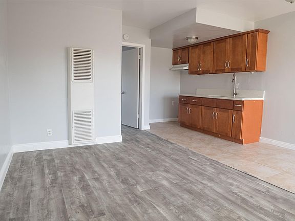 2nd image of 16433 Woodruff Ave APT 21