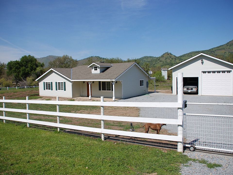Front view of the home and garage