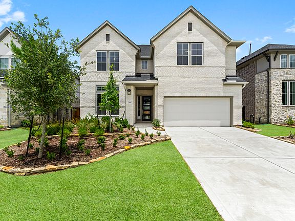 Stunning new construction home in the heart of Woodson's Reserve, ready to welcome you