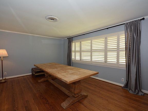 Note the beautiful hardwood floors in the formal living and dining areas!