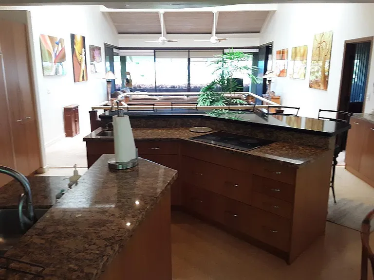 Upstairs Main Kitchen Looking Towards the Living Room and Balcony
