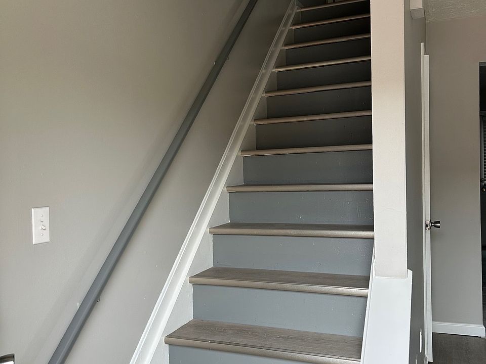 Stairs to bedrooms and full bath