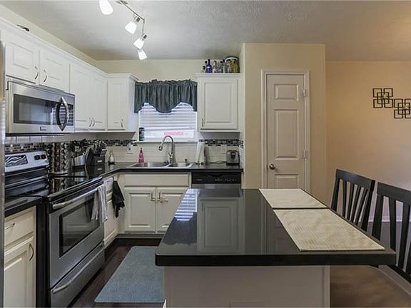 Island Kitchen with Granite Counter Tops.