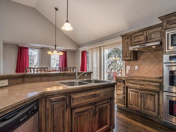 Work space allows easy access to Bar, Dining Room and Outdoor Entertaining