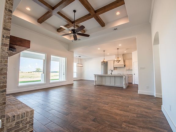 warm undertones compliment the kitchen.