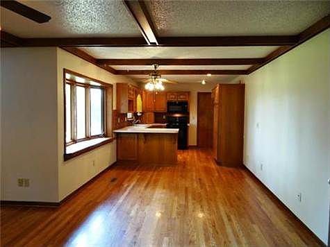 Open Breakfast Room & Kitchen Also With Hardwood Floors