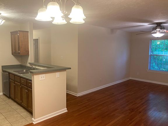 Open kitchen, dining, and living area.