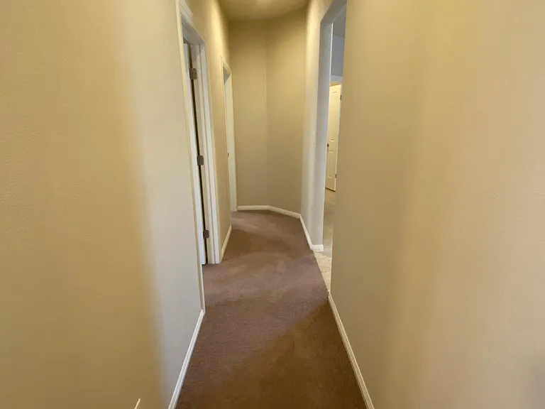 Hallway leading to 2nd and 3rd bedroom