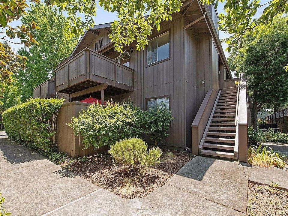 Private and serene entrance to this 2 bedroom condo with view of the pool