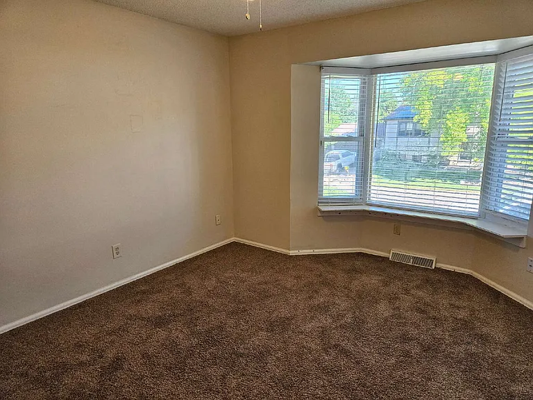 7055 W Fremont Pl — Photo 10