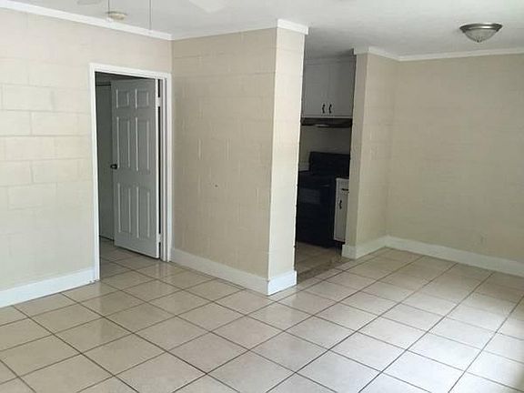 Living/Dining Room and walkway to bedroom