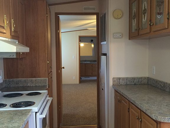 Kitchen Centrally Located in Home Next to Family Room