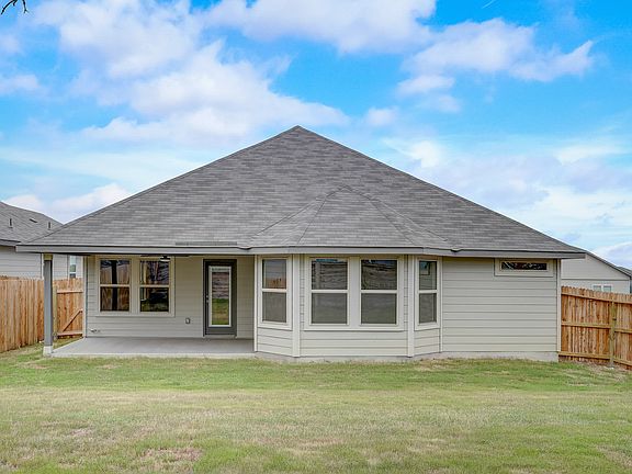 Back exterior of the Oleander floorplan at a Meritage Homes community.