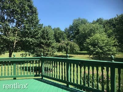 Rear deck overlooking secluded acreage