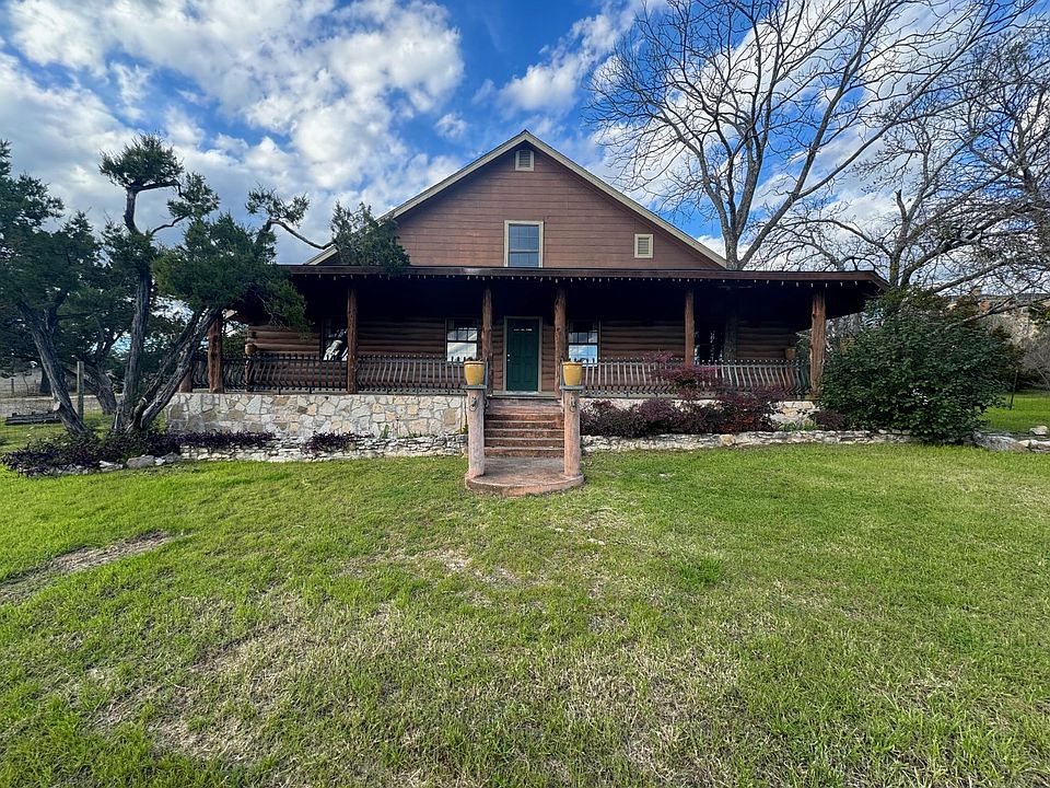 Country living with two bedroom, two bath, two living areas & large front porch