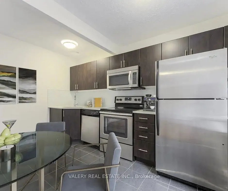 Building Photo - 2402 Queen St E #33