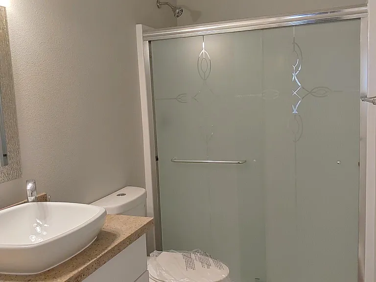 Walk in Shower Connected to Master Bedroom on Main Floor.