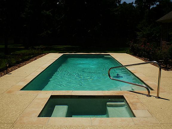 Both pool and spa are heated for year-round enjoyment.