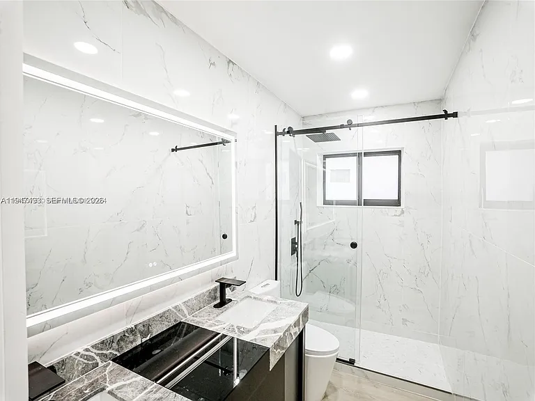 530 NE 91st St — Photo 24