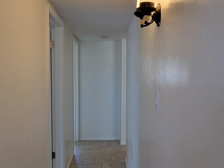 Hallway heading towards bedrooms.