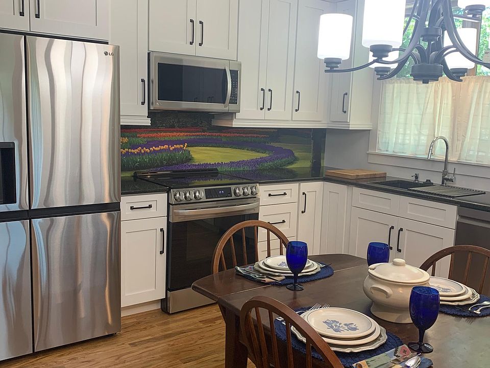 The eat-in kitchen has a large window over the sink for enjoying the natural light.
