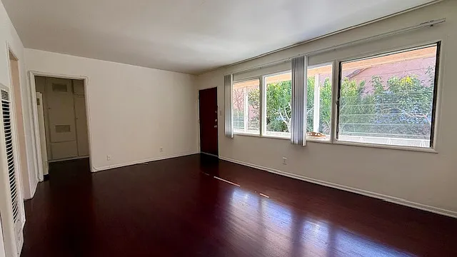 Spacious Living Room w/ Hardwood Floors