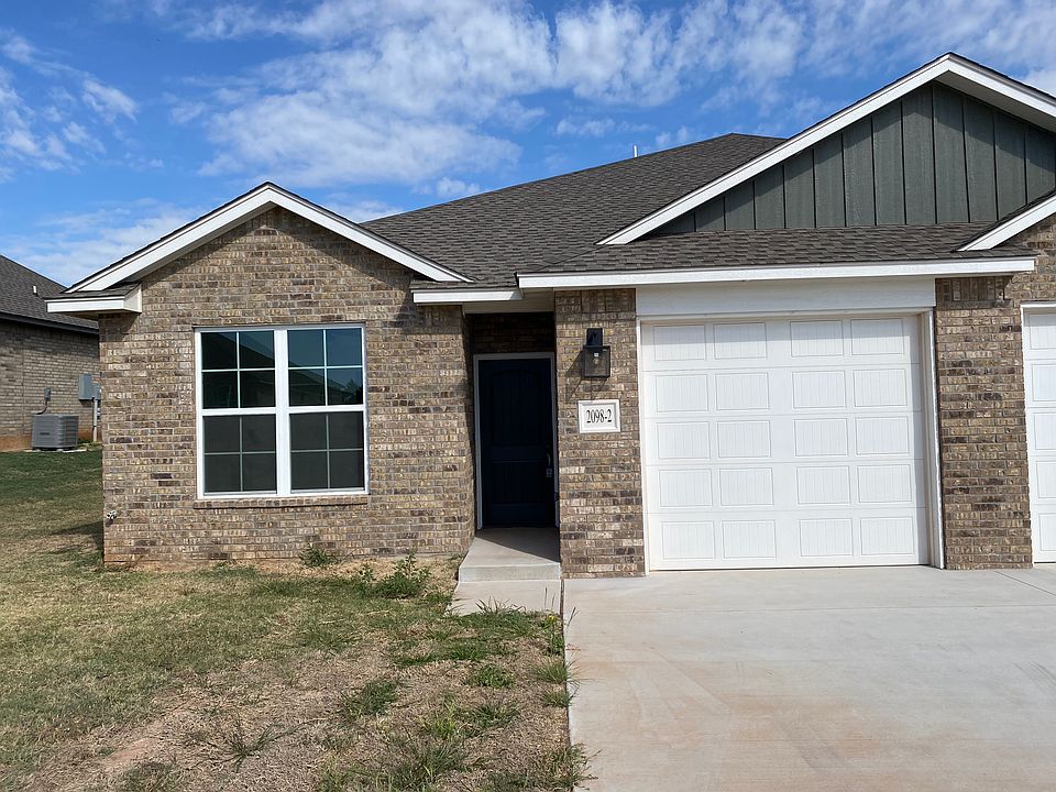 Front of Unit with 1 Car Garage
