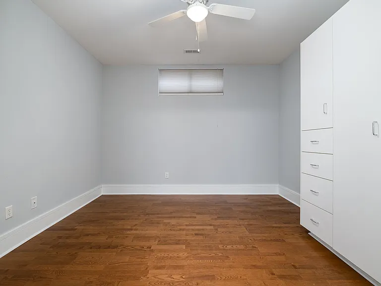 View of the 2nd bedroom from the bathroom.