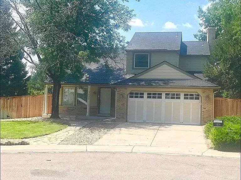 7029 S Dudley St — Photo 2