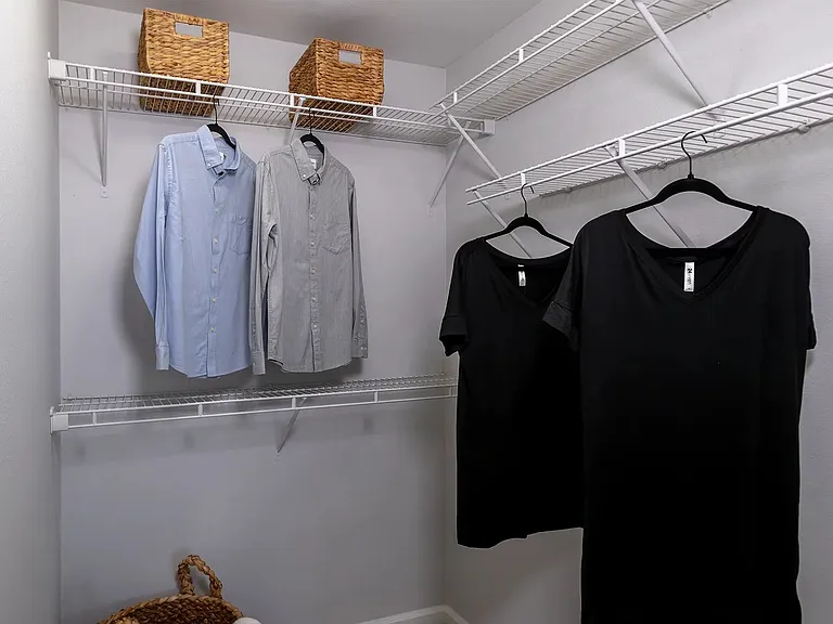 Effortlessly organize with custom shelving in our oversized walk-in closets - tailored with you and all your wardrobe treasures in mind!