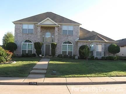 Exterior : Brick exterior, wood trim newly painted, new front windows down